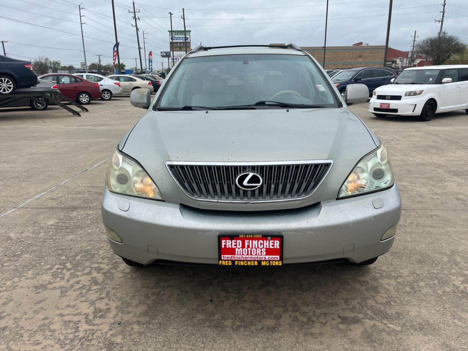 2004 SILVER /TAN Lexus RX 330 2WD (2T2GA31U44C) with an 3.3L V6 DOHC 24V engine, 5-Speed Automatic Overdrive transmission, located at 14700 Tomball Parkway 249, Houston, TX, 77086, (281) 444-2200, 29.928619, -95.504074 - Photo #1